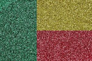 Benin flag depicted on many small shiny sequins. Colorful festival background for party photo