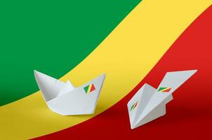 Congo flag depicted on paper origami airplane and boat. Handmade arts concept photo