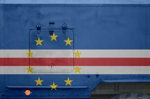 Cabo verde flag depicted on side part of military armored truck closeup. Army forces conceptual background photo