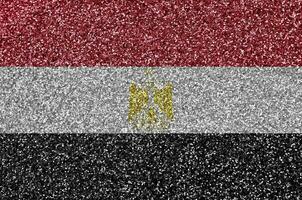 Egypt flag depicted on many small shiny sequins. Colorful festival background for party photo