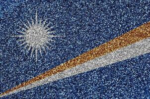 Marshall Islands flag depicted on many small shiny sequins. Colorful festival background for party photo