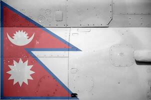 Nepal flag depicted on side part of military armored helicopter closeup. Army forces aircraft conceptual background photo