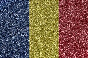 Romania flag depicted on many small shiny sequins. Colorful festival background for party photo