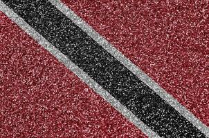 Trinidad and Tobago flag depicted on many small shiny sequins. Colorful festival background for party photo
