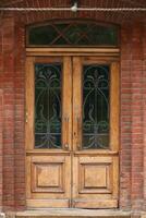 Old ancient wooden door texture in european medieval style photo