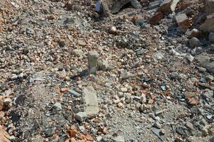 Pile of bricks and fragments of concrete from destroyed building photo