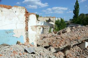 Collapsed industrial multistorey building in daytime photo