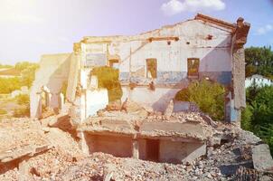 Collapsed industrial multistorey building in daytime photo