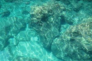 Stones at the bottom of the Aegean sea seascape photo