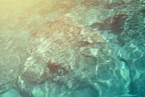 Stones at the bottom of the Aegean sea seascape photo