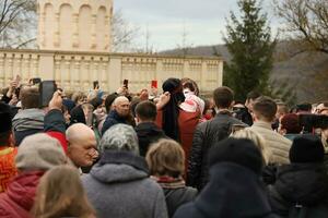 TERNOPIL, UKRAINE - APRIL 2, 2023 Many people during mission in complex of Ukrainian Jerusalem in the Mari spiritual center of Zarvanytsia In the Terebovlya district of the Ternopil photo