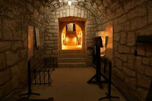 TERNOPIL, UKRAINE - AUGUST 23, 2023 The museum of tortures on territory of Zbarazh ancient castle in underground cellar photo
