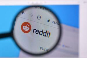 Homepage of reddit website on the display of PC, url - reddit.com. photo