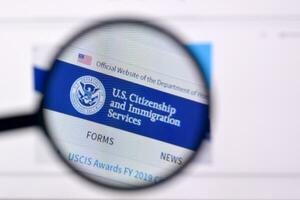 Homepage of uscis website on the display of PC, url - uscis.gov. photo