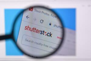 Homepage of shutterstock website on the display of PC, url - shutterstock.com. photo