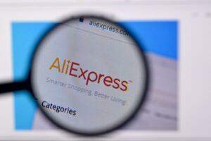 Homepage of aliexpress website on the display of PC, url - aliexpress.com. photo