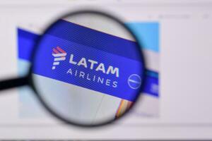 Homepage of latam airlines website on the display of PC, url - latam.com. photo