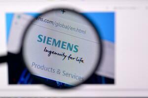 Homepage of siemens website on the display of PC, url - siemens.com. photo