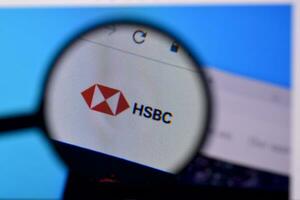 Homepage of hsbc website on the display of PC, url - www.hsbc.com. photo