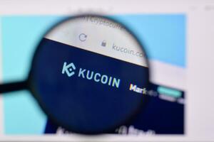 Homepage of kucoin website on the display of PC, url - kucoin.com. photo