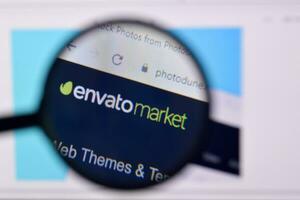 Homepage of envato market photodune website on the display of PC, url - photodune.net. photo