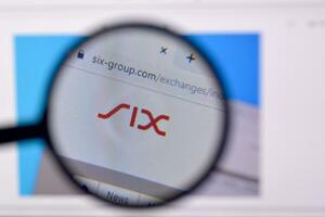 Homepage of six-group website on the display of PC, url - www.six-group.com. photo