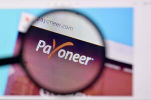 Homepage of payoneer website on the display of PC, url - payoneer.com. photo