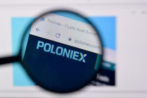Homepage of poloniex website on the display of PC, url - poloniex.com. photo