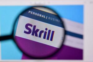 Homepage of skrill website on the display of PC, url - skrill.com. photo