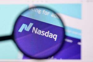Homepage of nasdaq website on the display of PC, url - business.nasdaq.com. photo
