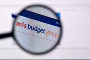 Homepage of avis budget group website on the display of PC, url - avisbudgetgroup.com. photo