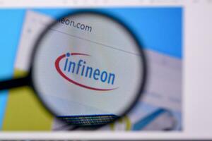 Homepage of infineon website on the display of PC, url - infineon.com. photo