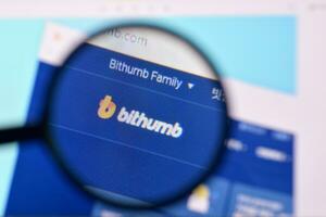 Homepage of bithumb website on the display of PC, url - bithumb.com. photo