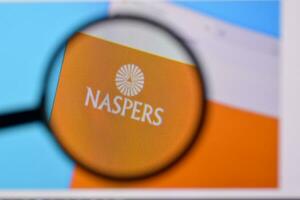 Homepage of naspers website on the display of PC, url - naspers.com. photo