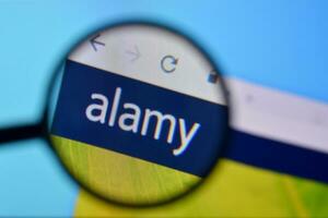 Homepage of alamy website on the display of PC, url - alamy.com. photo