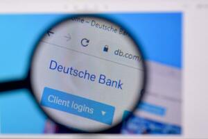 Homepage of deutsche bank website on the display of PC, url - db.com. photo