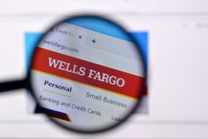Homepage of wells fargo website on the display of PC, url - wellsfargo.com. photo