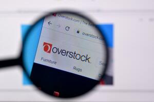 Homepage of overstock website on the display of PC, url - overstock.com. photo