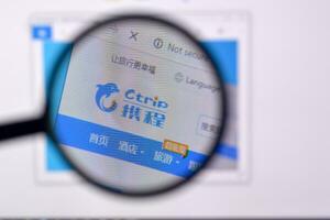 Homepage of ctrip website on the display of PC, url - ctrip.com. photo