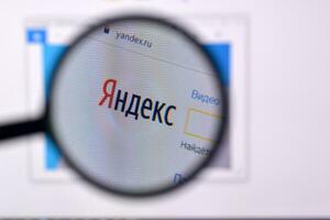Homepage of yandex website on the display of PC, url - yandex.ru. photo