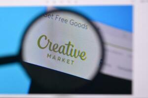 Homepage of creativemarket website on the display of PC, url - creativemarket.com. photo