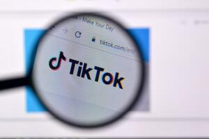 Homepage of tiktok website on the display of PC, url - tiktok.com. photo