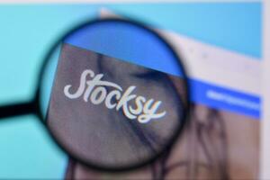 Homepage of stocksy website on the display of PC, url - stocksy.com. photo