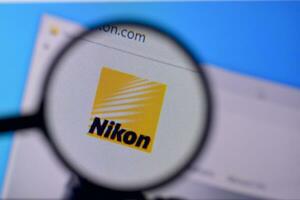 Homepage of nikon website on the display of PC, url - nikon.com. photo