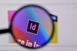 Web page of adobe indesign product on official website on the display of PC photo