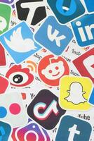 Many paper logos of popular social networks and internet resources. Colorful banner photo