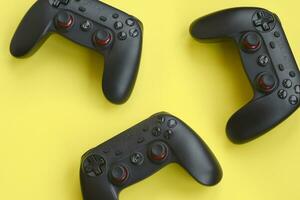 Gamesir g3s video game controllers on yellow background photo