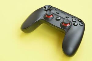 Gamesir g3s video game controller on yellow background photo