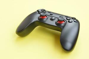 Gamesir g3s video game controller on yellow background photo