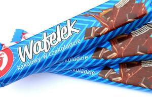 KHARKOV, UKRAINE - JANUARY 3, 2021 Wafelek chocolate wafer product by Auchan, a French multinational retail group in Croix, France photo